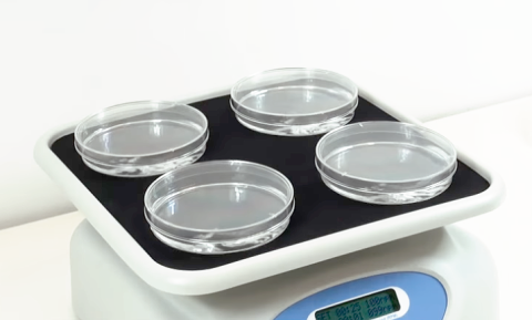 Orbital shaker PSU with platform for four Petri dishes.